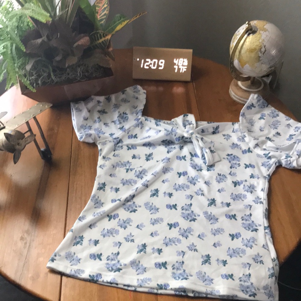 White purple flowered shirt